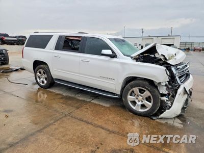 Czwarte zdjęcie samochodu z boku: 2016 CHEVROLET SUBURBAN K1500 LTZ VIN:1GNSKJKC8GR196931 - miniatura