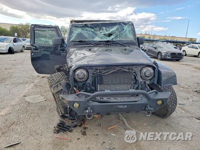 Piąte zdjęcie samochodu w środku: 2013 JEEP WRANGLER UNLIMITED SAHARA VIN:1C4BJWEG8DL634854 - miniatura