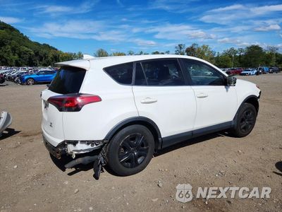 Trzecie zdjęcie samochodu z tyłu: 2018 TOYOTA RAV4 LE VIN:JTMBFREV8JJ195339 - miniatura