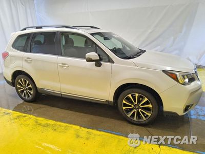 Czwarte zdjęcie samochodu z boku: 2017 SUBARU FORESTER 2.0XT TOURING VIN:JF2SJGWC2HH508629 - miniatura