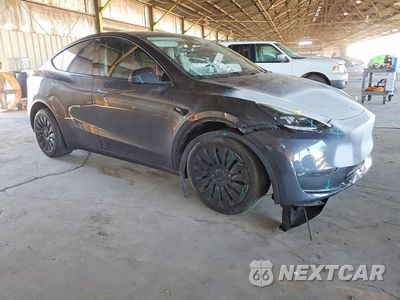 Czwarte zdjęcie samochodu z boku: 2024 TESLA MODEL Y VIN:7SAYGDEE3RA238871 - miniatura