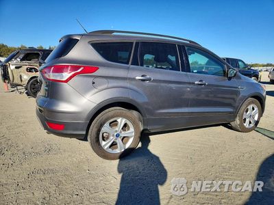 Trzecie zdjęcie samochodu z tyłu: 2014 FORD ESCAPE SE VIN:1FMCU0GX0EUB09560 - miniatura