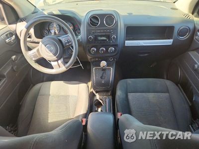 Zdjęcie 8 z 13 samochodu: 2014 JEEP COMPAS VIN:1C4NJCBA9ED630609 - miniatura