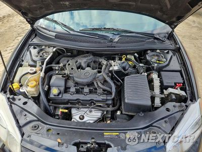 Zdjęcie 11 z 12 samochodu: 2004 CHRYSLER SEBRING LIMITED VIN:1C3EL65R34N156747 - miniatura