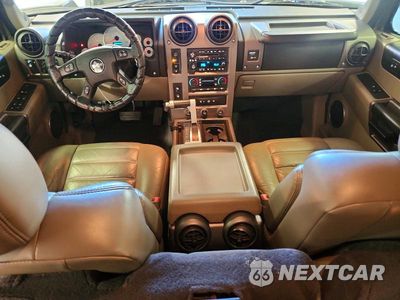 Zdjęcie 8 z 14 samochodu: 2004 HUMMER H2 VIN:5GRGN23U34H110279 - miniatura
