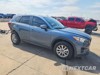 Czwarte zdjęcie samochodu z boku: 2016 MAZDA CX-5 TOURING VIN:JM3KE2CY4G0769481 - miniatura