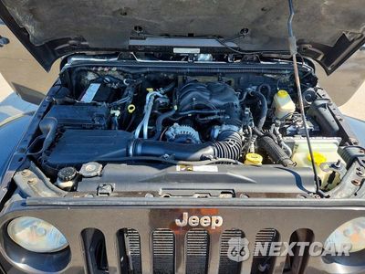 Zdjęcie 11 z 12 samochodu: 2013 JEEP WRANGLER UNLIMITED SAHARA VIN:1C4BJWEG8DL668129 - miniatura