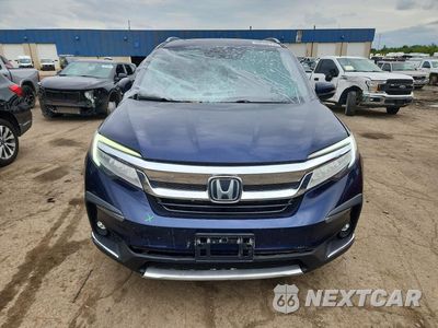 Piąte zdjęcie samochodu w środku: 2021 HONDA PILOT TOURING VIN:5FNYF5H66MB000437 - miniatura