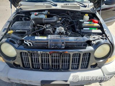 Zdjęcie 11 z 12 samochodu: 2005 JEEP LIBERTY SPORT VIN:1J8GK48KX5W516496 - miniatura