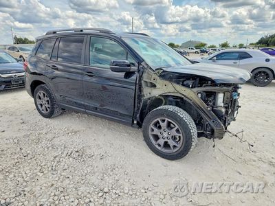 Czwarte zdjęcie samochodu z boku: 2024 HONDA PASSPORT TRAIL SPORT VIN:5FNYF8H65RB007551 - miniatura