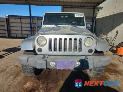 Piąte zdjęcie samochodu w środku: 2012 JEEP WRANGLER UNLIMITED RUBICON VIN:1C4HJWFG5CL125375 - miniatura