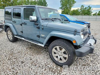 Czwarte zdjęcie samochodu z boku: 2015 JEEP WRANGLER UNLIMITED SAHARA VIN:1C4BJWEGXFL561781 - miniatura