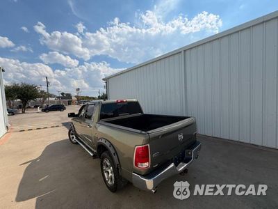 Trzecie zdjęcie samochodu z tyłu: 2014 RAM 1500 LARAMIE VIN:1C6RR7NT9ES209619 - miniatura