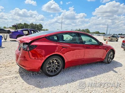 Trzecie zdjęcie samochodu z tyłu: 2022 TESLA MODEL 3 VIN:5YJ3E1EA1NF191930 - miniatura