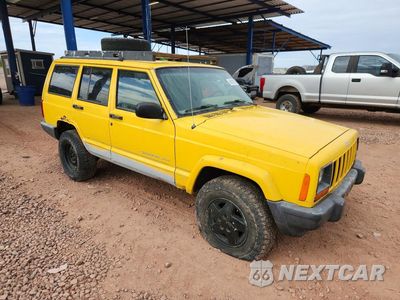 Czwarte zdjęcie samochodu z boku: 2001 JEEP CHEROKEE SPORT VIN:1J4FF48S91L584088 - miniatura