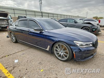 Czwarte zdjęcie samochodu z boku: 2019 BMW 750 I VIN:WBA7F0C52KGM24498 - miniatura