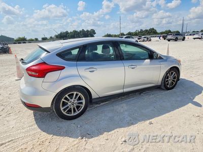 Trzecie zdjęcie samochodu z tyłu: 2016 FORD FOCUS SE VIN:1FADP3K21GL217035 - miniatura