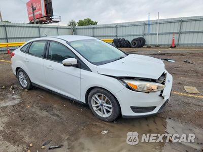 Czwarte zdjęcie samochodu z boku: 2017 FORD FOCUS SE VIN:1FADP3F29HL229994 - miniatura