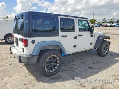Trzecie zdjęcie samochodu z tyłu: 2014 JEEP WRANGLER UNLIMITED SAHARA VIN:1C4BJWEG0EL206987 - miniatura