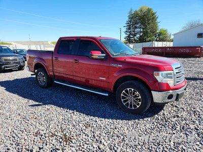 Czwarte zdjęcie samochodu z boku: 2014 FORD F150 SUPERCREW VIN:1FTFW1ET5EKE14288 - miniatura