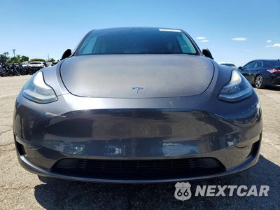 Piąte zdjęcie samochodu w środku: 2020 TESLA MODEL Y VIN:5YJYGDEE3LF010604 - miniatura