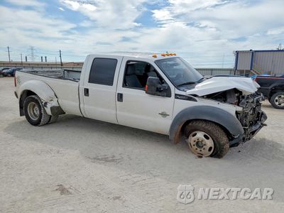 Czwarte zdjęcie samochodu z boku: 2012 FORD F450 SUPER DUTY VIN:1FT8W4DT6CEB69668 - miniatura