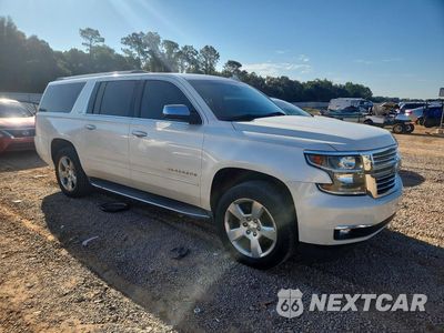 Czwarte zdjęcie samochodu z boku: 2015 CHEVROLET SUBURBAN C1500 LTZ VIN:1GNSCKKC4FR653588 - miniatura