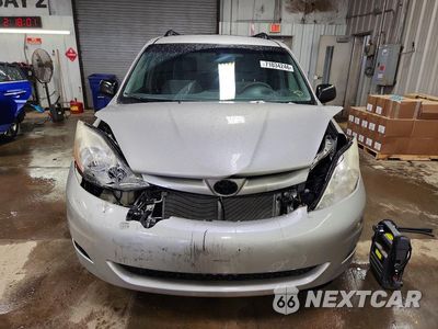 Piąte zdjęcie samochodu w środku: 2010 TOYOTA SIENNA LE 7-PASSENGER VIN:5TDKK4CC2AS313369 - miniatura