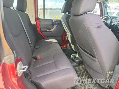 Zdjęcie 11 z 13 samochodu: 2013 JEEP WRANGLER UNLIMITED SPORT VIN:1C4HJWDG1DL604963 - miniatura