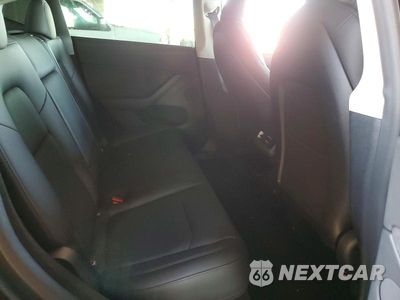 Zdjęcie 10 z 12 samochodu: 2024 TESLA MODEL Y VIN:7SAYGDEE3RA238871 - miniatura