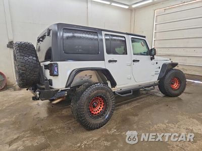 Trzecie zdjęcie samochodu z tyłu: 2013 JEEP WRANGLER UNLIMITED SPORT VIN:1C4HJWDG4DL623376 - miniatura