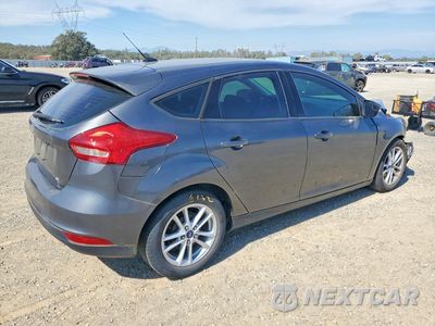 Trzecie zdjęcie samochodu z tyłu: 2017 FORD FOCUS SE VIN:1FADP3K2XHL341984 - miniatura