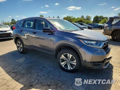 Czwarte zdjęcie samochodu z boku: 2019 HONDA CR-V LX VIN:5J6RW6H35KL006427 - miniatura
