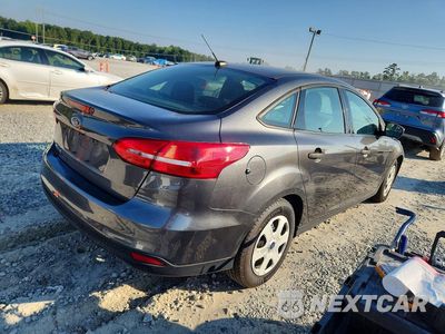 Trzecie zdjęcie samochodu z tyłu: 2018 FORD FOCUS S VIN:1FADP3E28JL259804 - miniatura