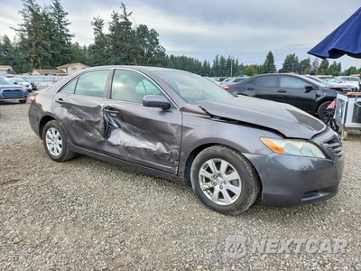 Czwarte zdjęcie samochodu z boku: 2007 TOYOTA CAMRY HYBRID VIN:JTNBB46K773041717 - miniatura