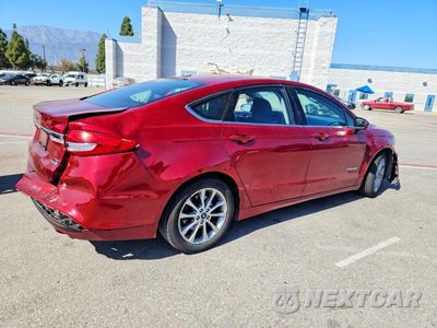 Trzecie zdjęcie samochodu z tyłu: 2017 FORD FUSION SE HYBRID VIN:3FA6P0LU2HR231150 - miniatura