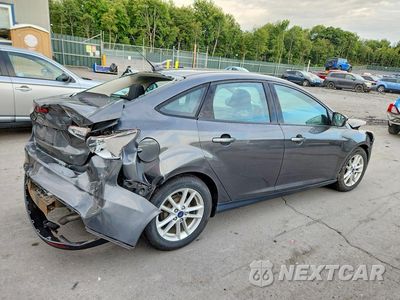 Trzecie zdjęcie samochodu z tyłu: 2016 FORD FOCUS SE VIN:1FADP3F23GL287615 - miniatura