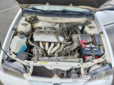 Zdjęcie 11 z 12 samochodu: 1999 TOYOTA COROLLA VE VIN:1NXBR12E0XZ164957 - miniatura