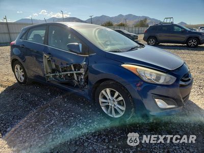 Czwarte zdjęcie samochodu z boku: 2014 HYUNDAI ELANTRA GT BASE VIN:KMHD35LH1EU166191 - miniatura