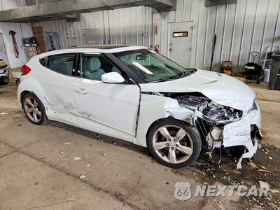 Czwarte zdjęcie samochodu z boku: 2014 HYUNDAI VELOSTER BASE VIN:KMHTC6AD2EU211950 - miniatura