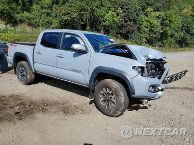 Czwarte zdjęcie samochodu z boku: 2018 TOYOTA TACOMA TRD OFF-ROAD VIN:3TMCZ5AN5JM181704 - miniatura