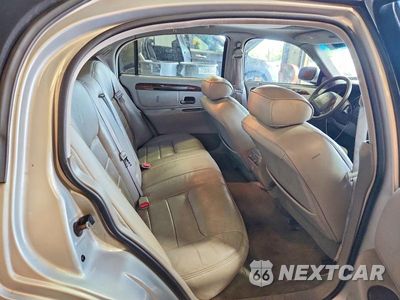 Zdjęcie 10 z 12 samochodu: 1999 LINCOLN TOWN CAR SIGNATURE VIN:1LNHM82W8XY635126 - miniatura