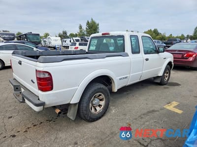 Trzecie zdjęcie samochodu z tyłu: 2002 FORD RANGER SUPER CAB VIN:1FTYR14U42PA23318 - miniatura