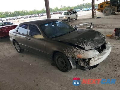 Czwarte zdjęcie samochodu z boku: 2000 MAZDA 626 ES VIN:1YVGF22C5Y5164210 - miniatura
