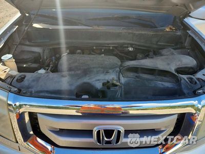 Zdjęcie 12 z 13 samochodu: 2011 HONDA PILOT EX VIN:5FNYF4H41BB002778 - miniatura