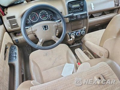 Zdjęcie 8 z 13 samochodu: 2002 HONDA CR-V LX VIN:JHLRD78412C050177 - miniatura
