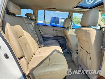 Zdjęcie 11 z 13 samochodu: 2006 TOYOTA HIGHLANDER HYBRID VIN:JTEEW21AX60025550 - miniatura