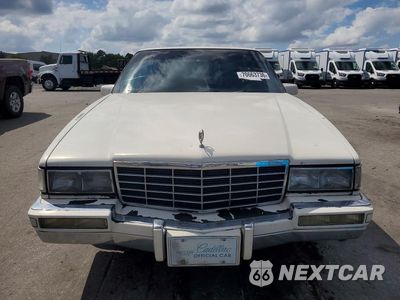 Piąte zdjęcie samochodu w środku: 1993 CADILLAC DEVILLE VIN:1G6CD53B2P4287343 - miniatura