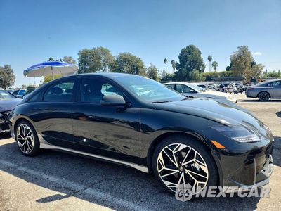 Czwarte zdjęcie samochodu z boku: 2023 HYUNDAI IONIQ 6 SEL VIN:KMHM34AC3PA038816 - miniatura