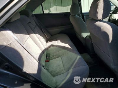 Zdjęcie 10 z 13 samochodu: 2002 TOYOTA CAMRY LE VIN:JTDBE32K820102661 - miniatura